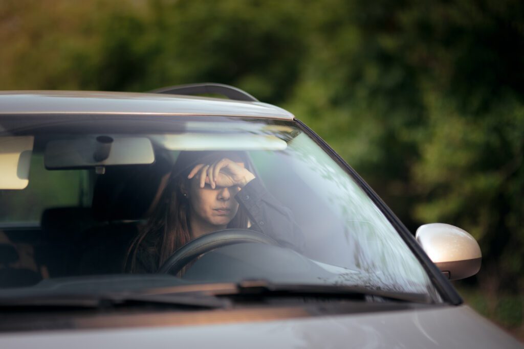 Woman,Driving,Feeling,Anxiety,Behind,The,Wheel